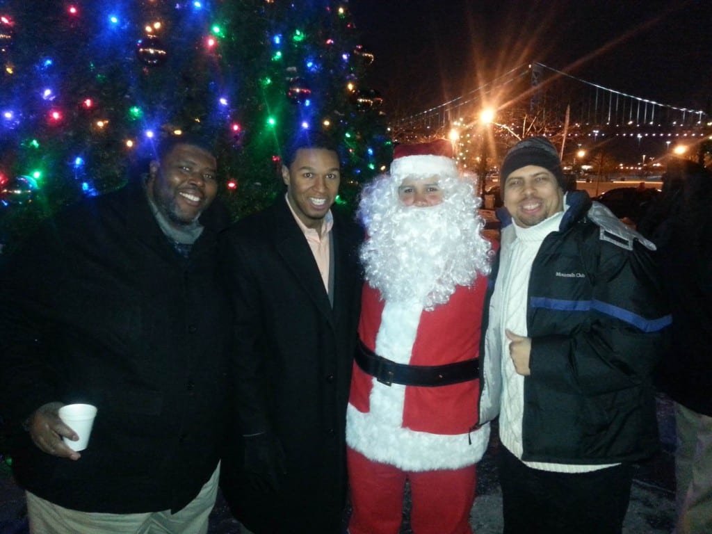 Christmas Tree Lighting Event with the Honorable Mayor Dana Redd Pictured Left to Right: Willie Hunter, Director of Operations; Falio Leyba Martinez, Commissioner; Santa Claus; Angel L. Alamo, Board Chairman.